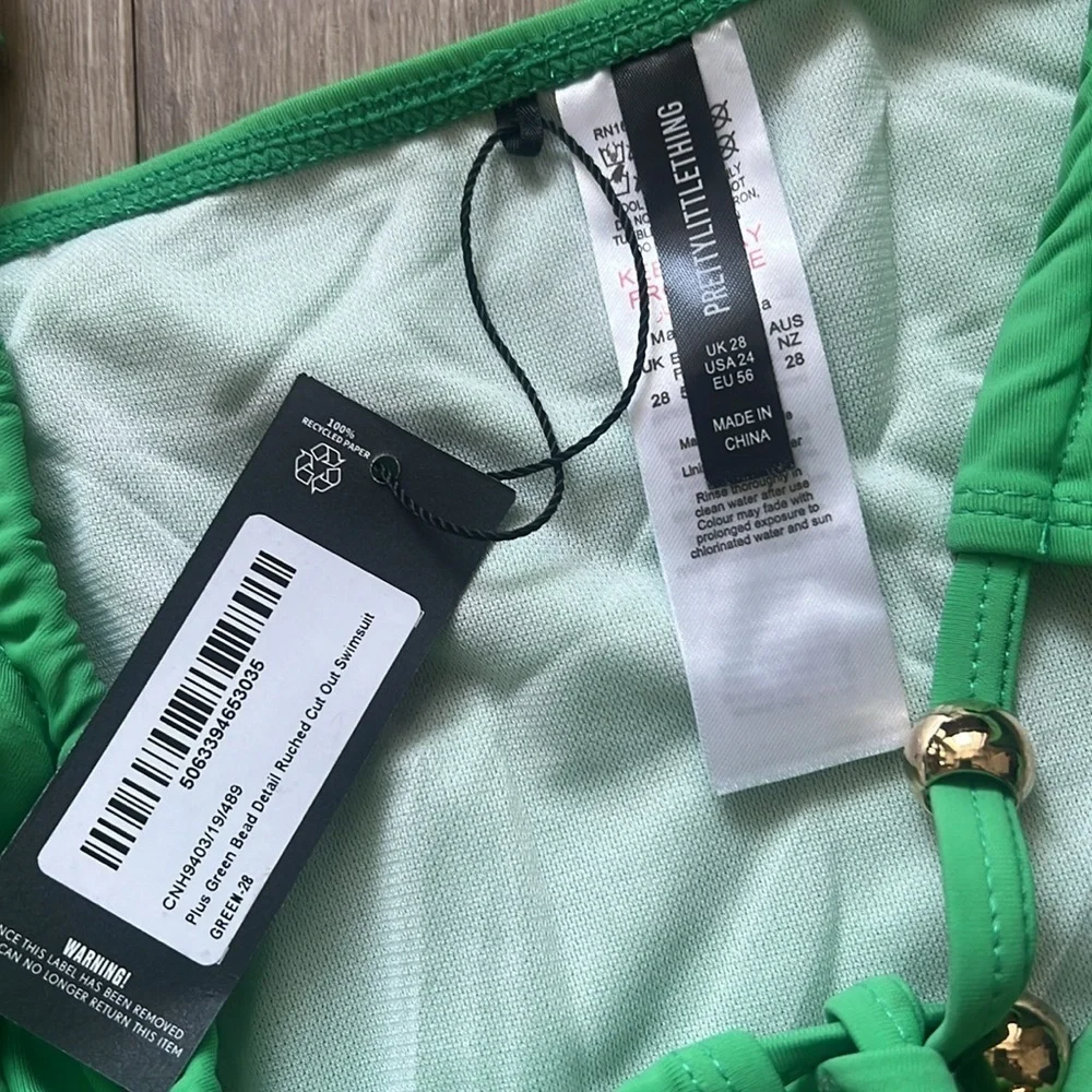 PrettyLittleThing Green Cut-Out One Piece Swimsuit